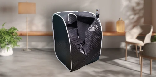 Compact black pet carrier with mesh sides and white trim.